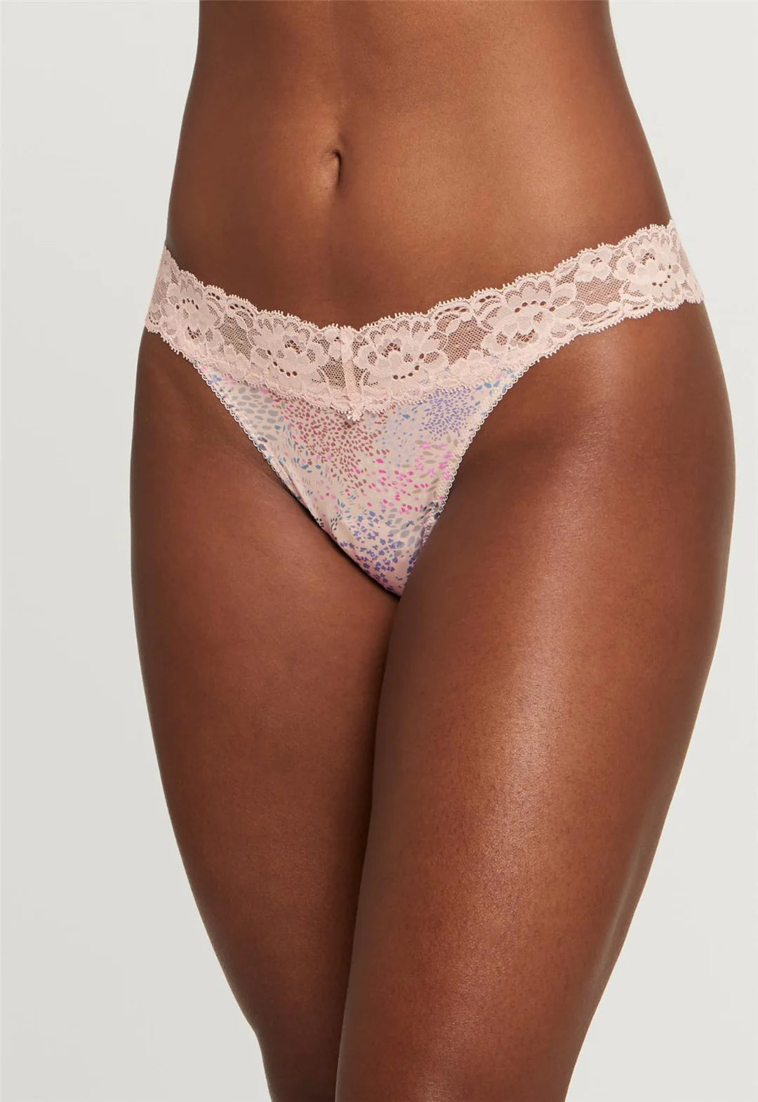 Bra with a quarter - cup design for a very revealing style Montelle 9002 Thong in Flower Fields Bra with a quarter - cup design for a very revealing style Montelle 9002 Thong in Flower Fields
